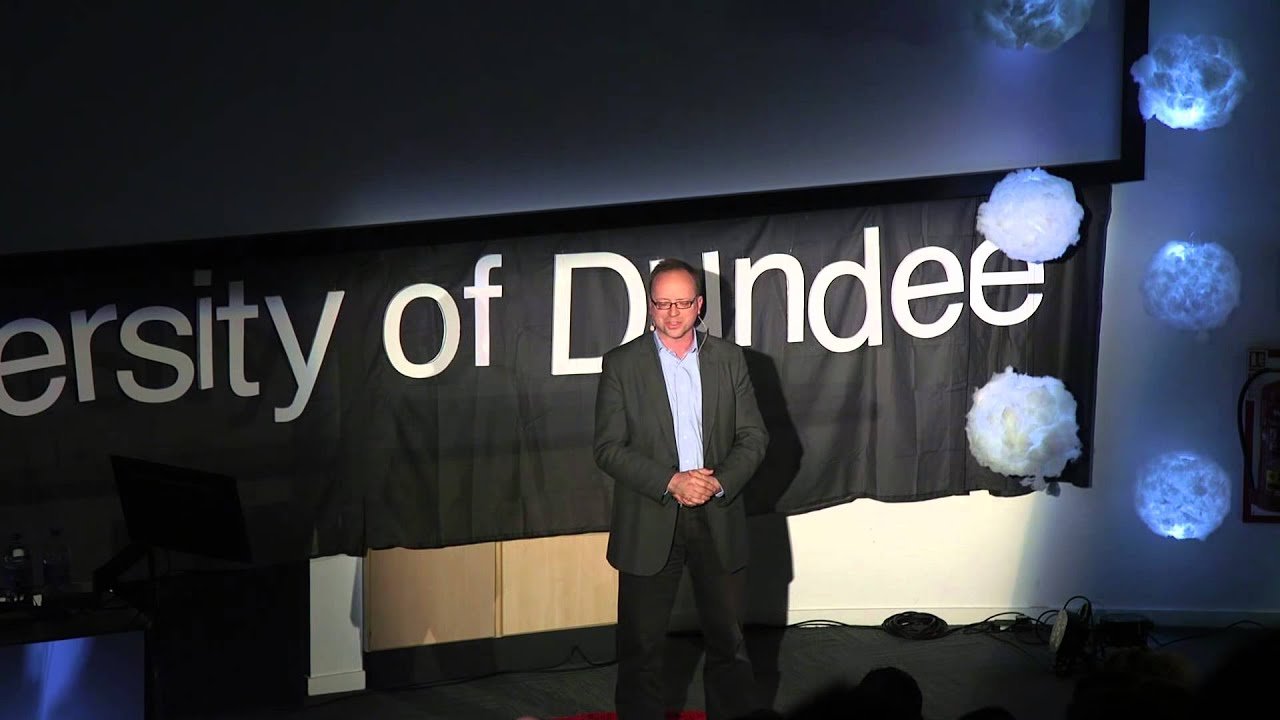 A thoughtful Gambian leader advocating for ethical political discourse and national unity.